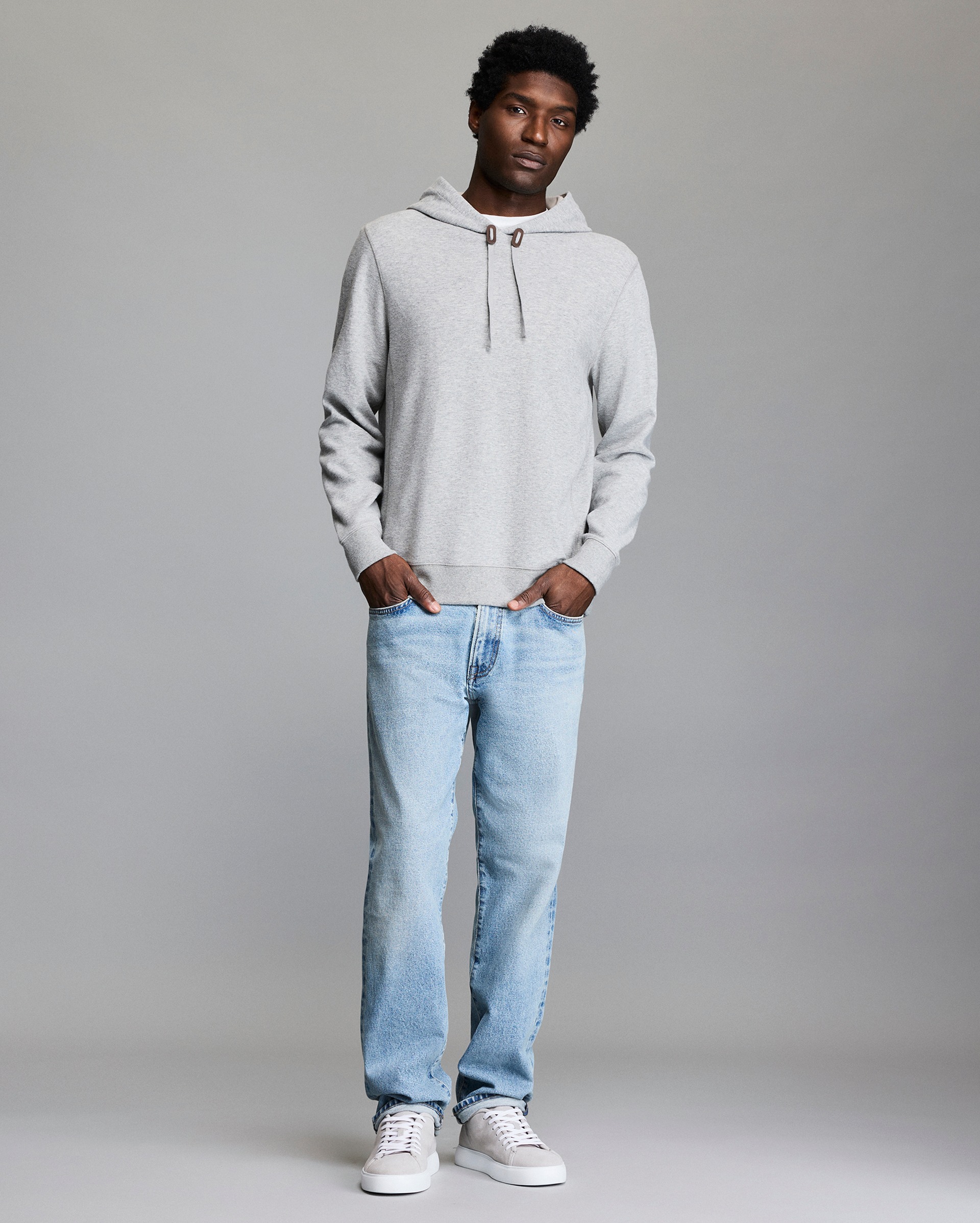 Model shows the fit of the hoodie.