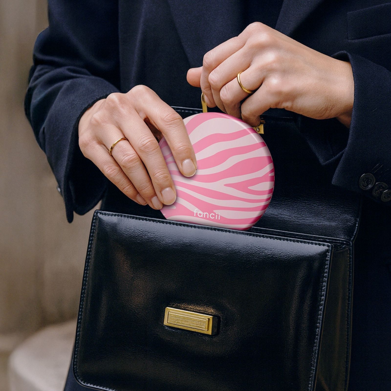 Mini Taylor in Lilac Bliss by Fancii & Co. easily slips into a pocket