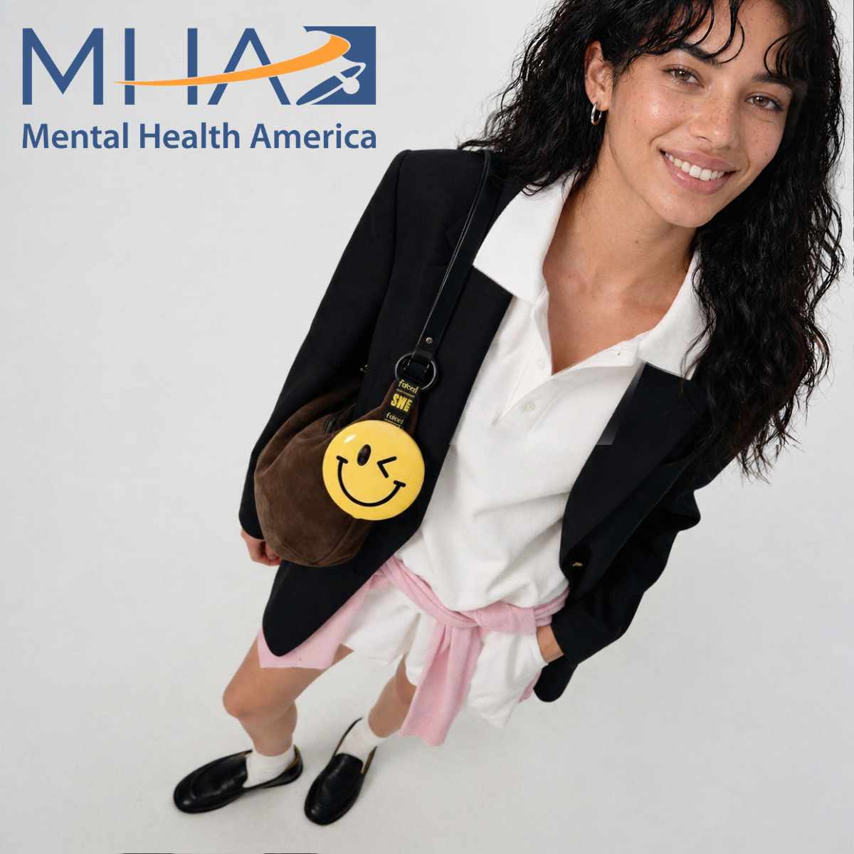 A portion of proceeds from your purchase will be donated to Mental Health America to help support others. Model with Mental Health America logo