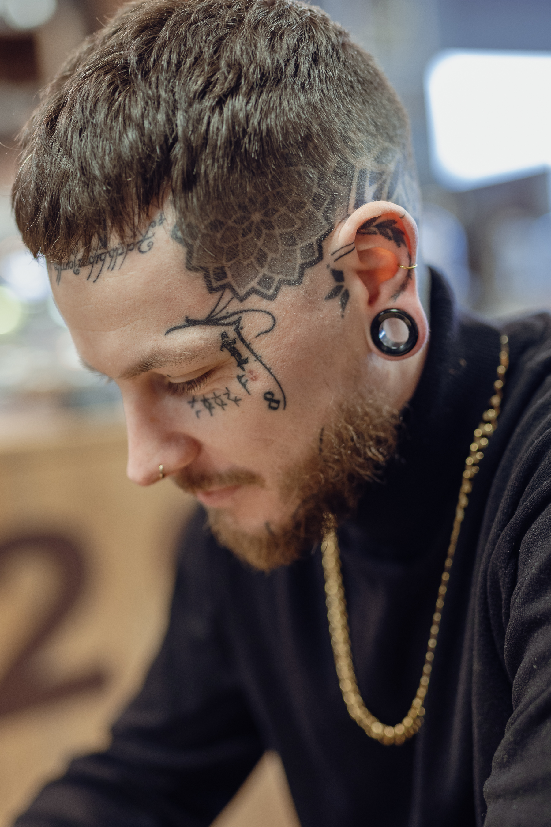 Guy wearing cool Blue Tiger Eye Stone Tunnel