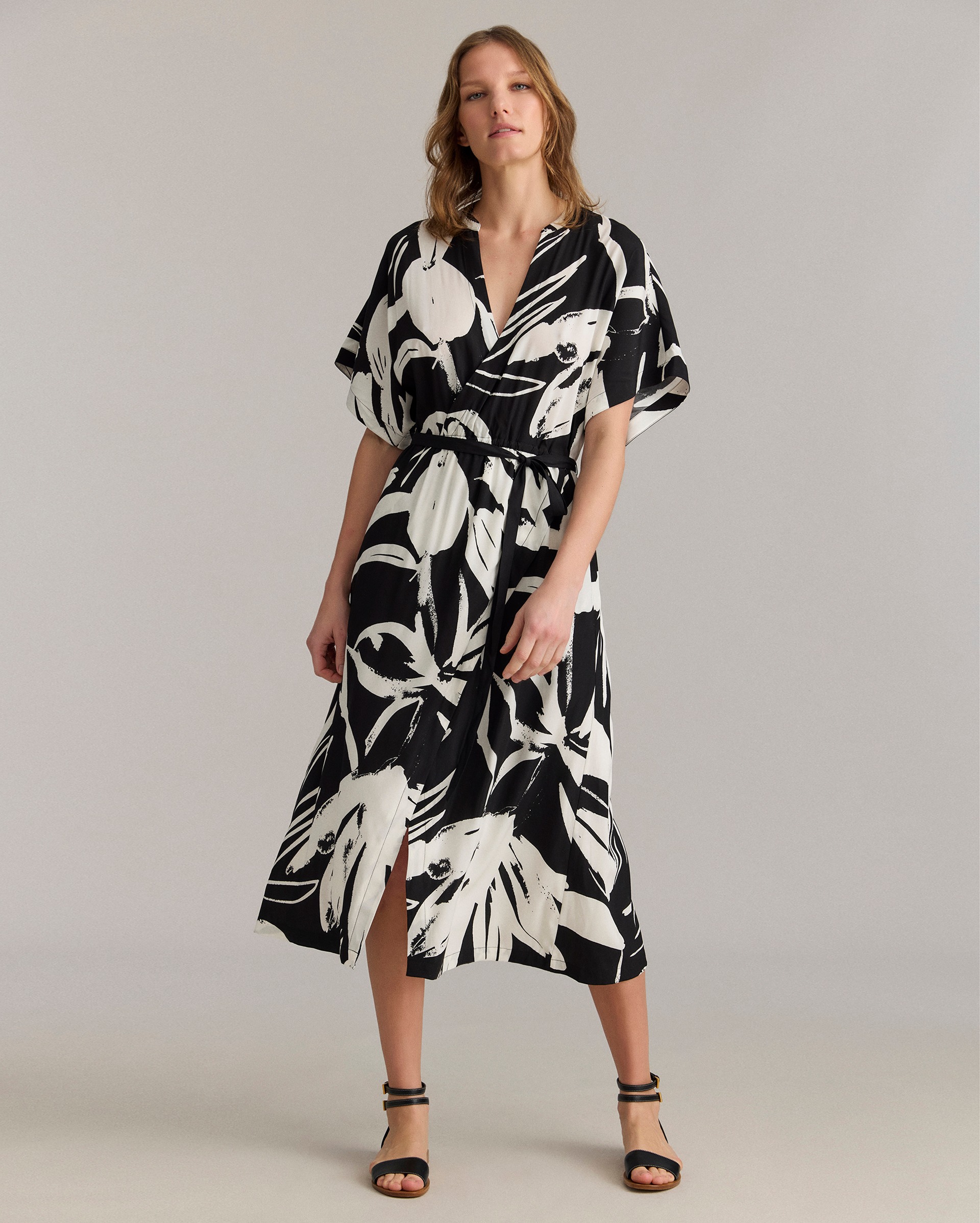 Model shows the fit of the dress.