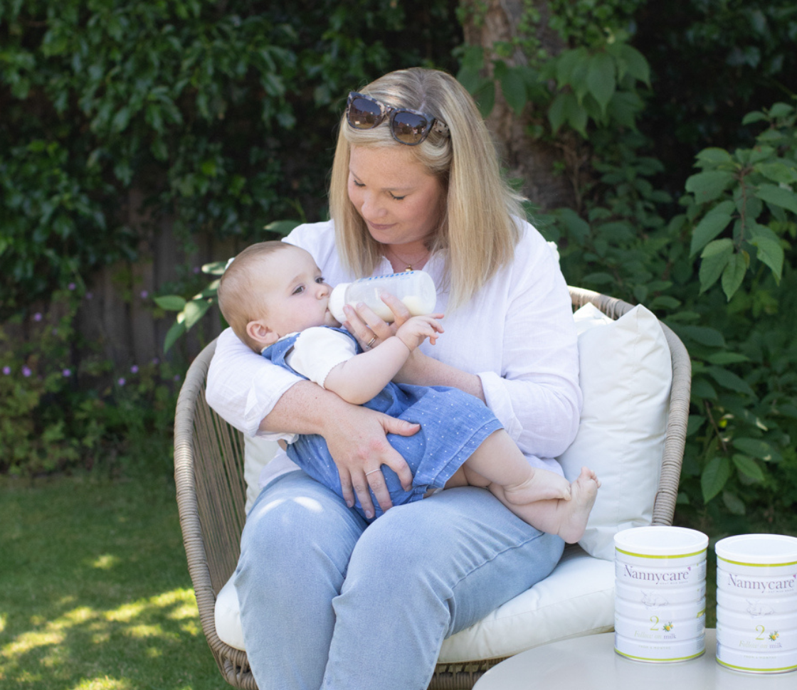 baby_feeding_with_mother