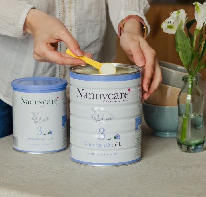 nannycare_growing_up_milk_tin_and_scoop