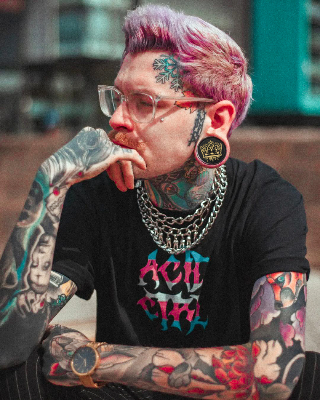 Man Wearing Gold Crown Acrylic Inlay Wood Plugs Crown Plug / Gauge - Black & Gold Inlay Ebony Wood | Convex Double Flare