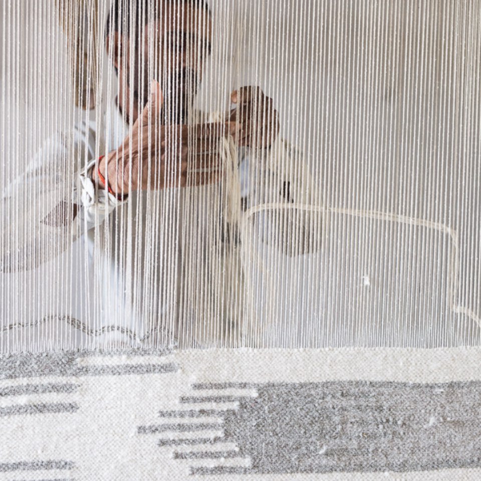WOVEN BY HAND