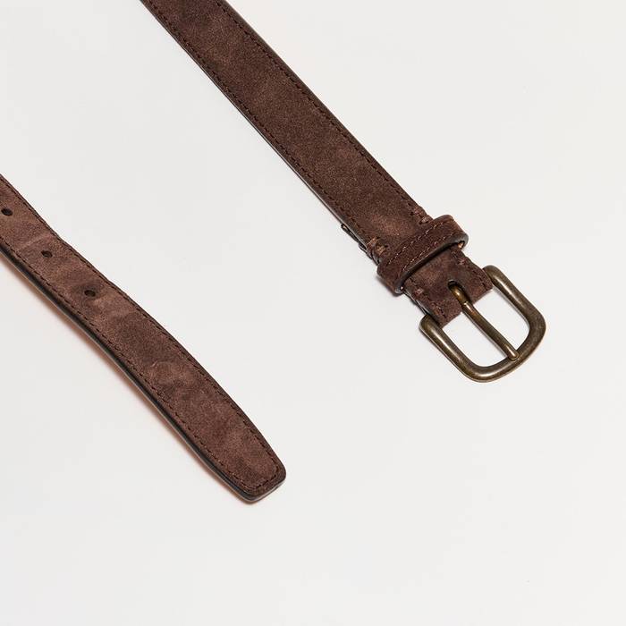 Top and bottom of the belt.