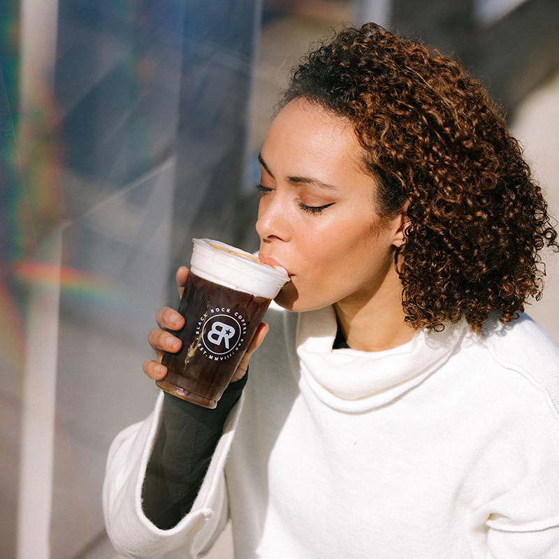 Honey Bee Cold Brew Lady Drinking Image