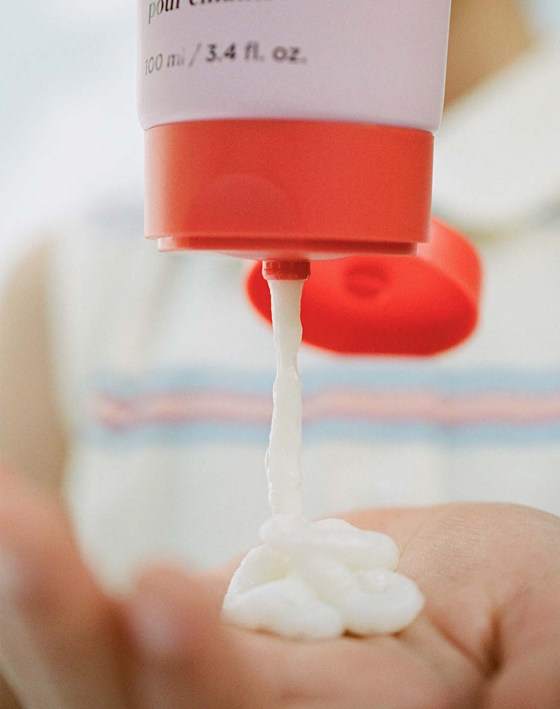 Kids Cloud Face Wash Travel Size spread to highlight its texture