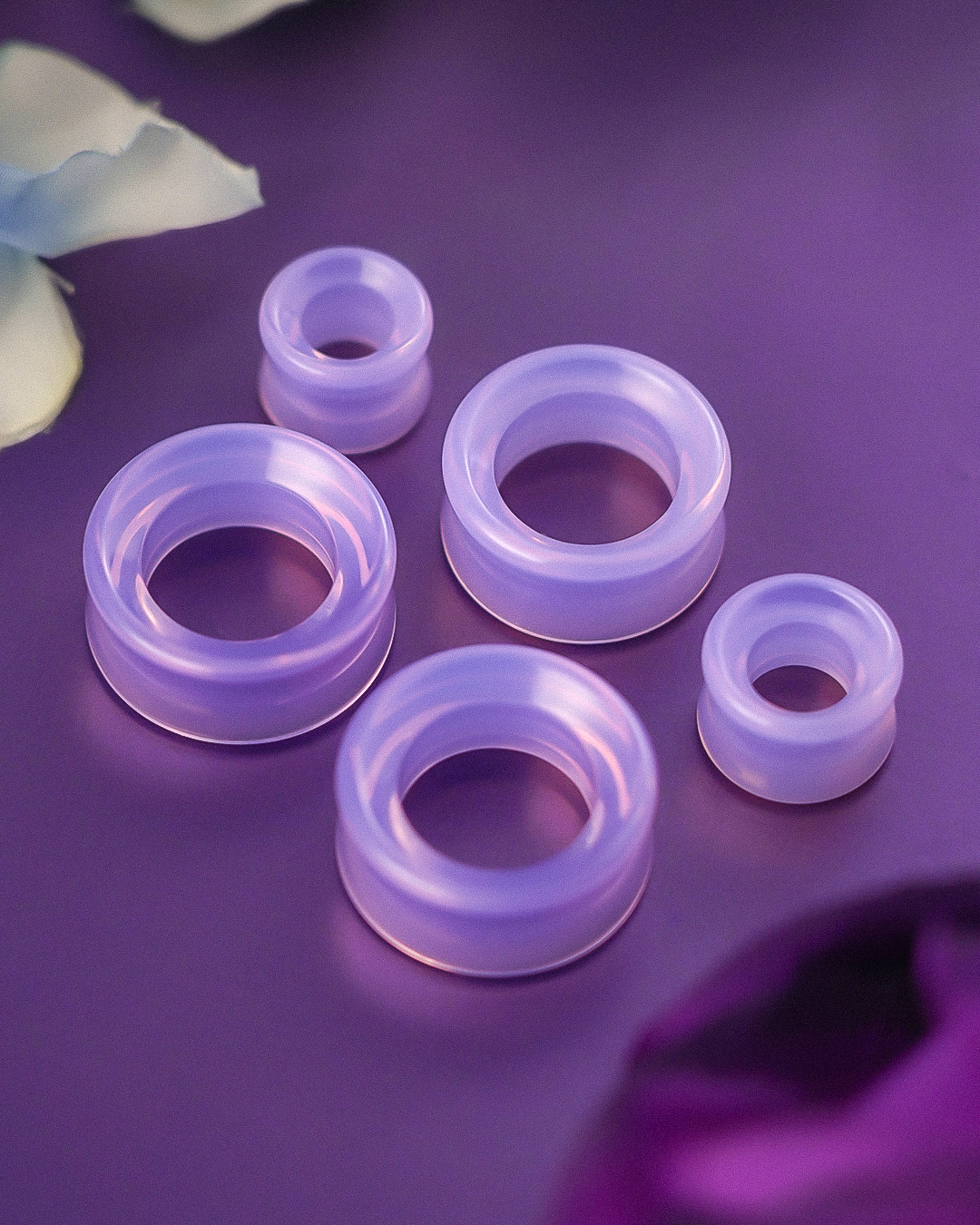 Girl wearing cute  Pink Opalite Glass Ear Tunnel