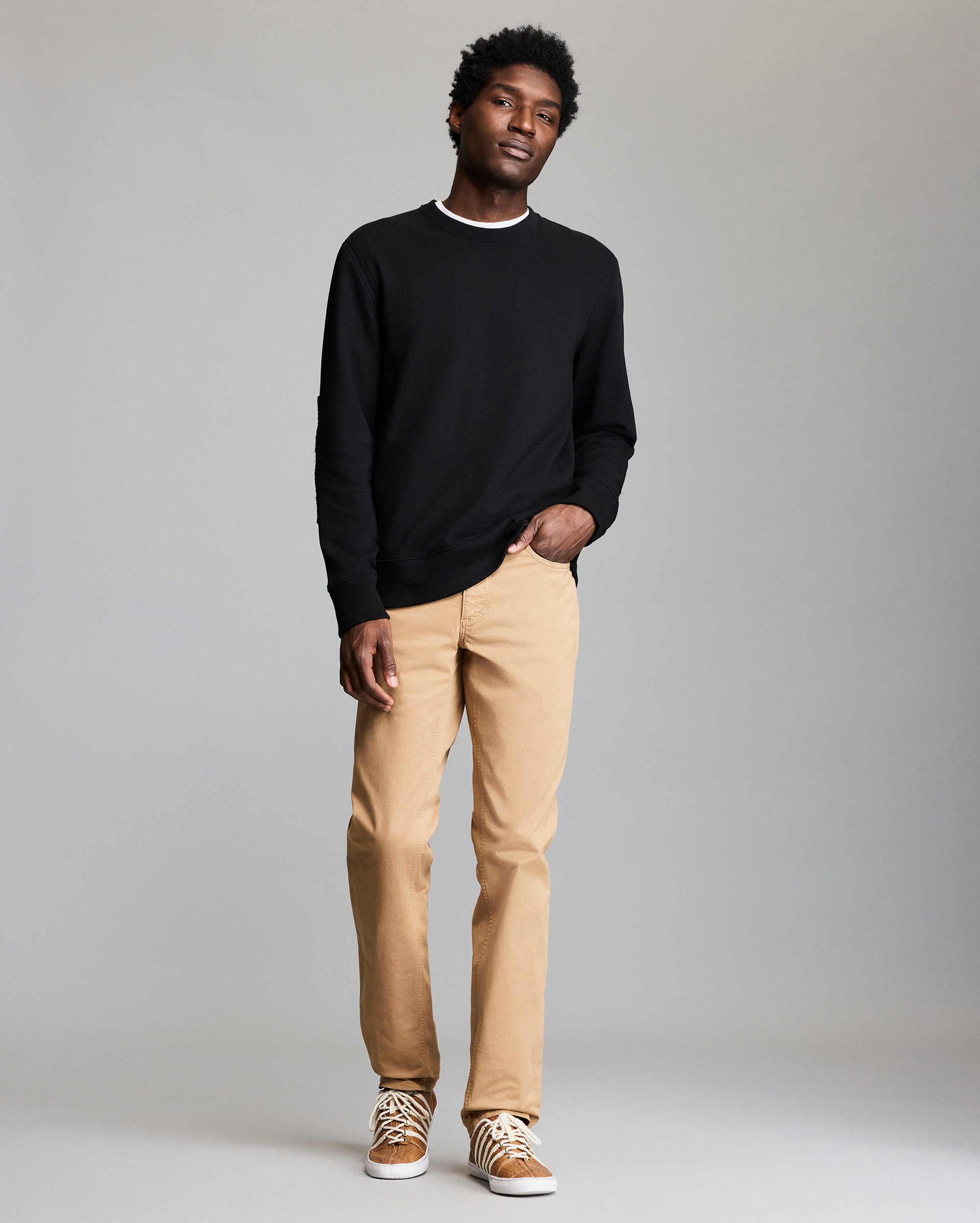 Model shows the fit of the sweatshirt.