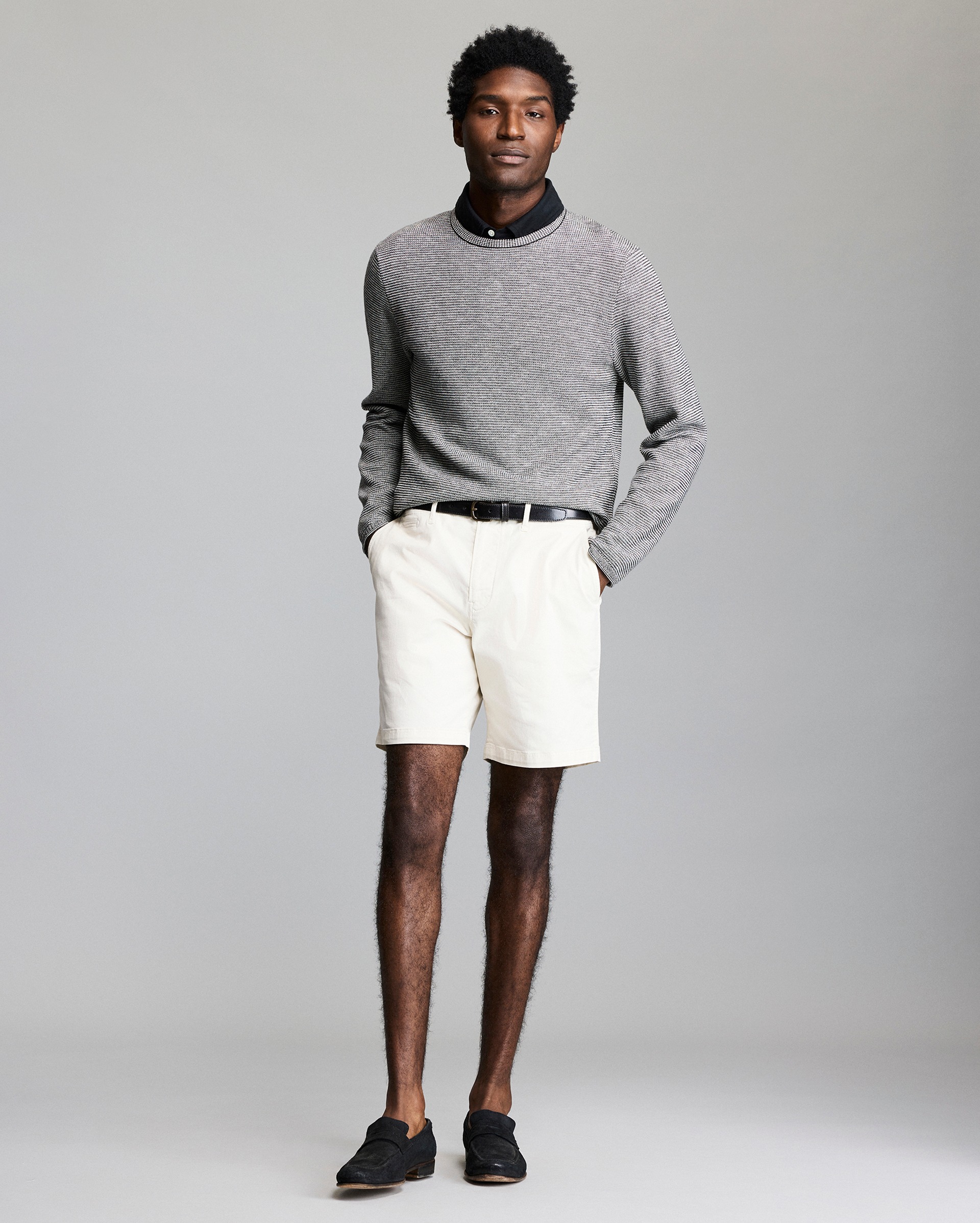 Model shows the fit of the sweater.
