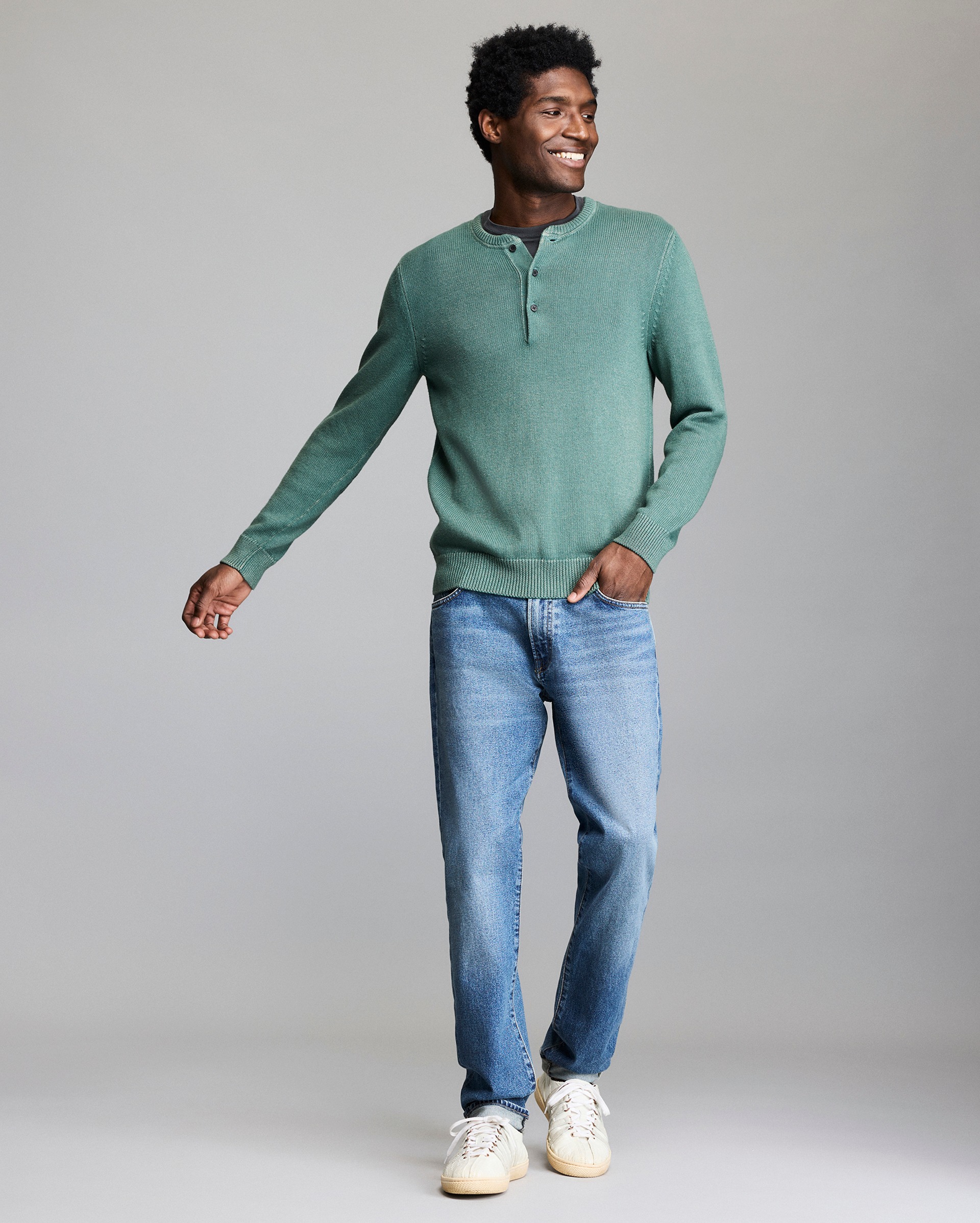 Model wears the sweater henley.