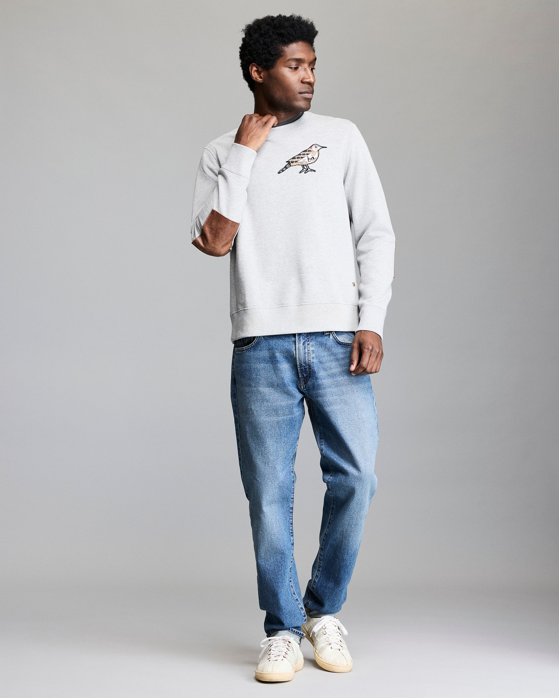 Model shows the fit of the sweatshirt.