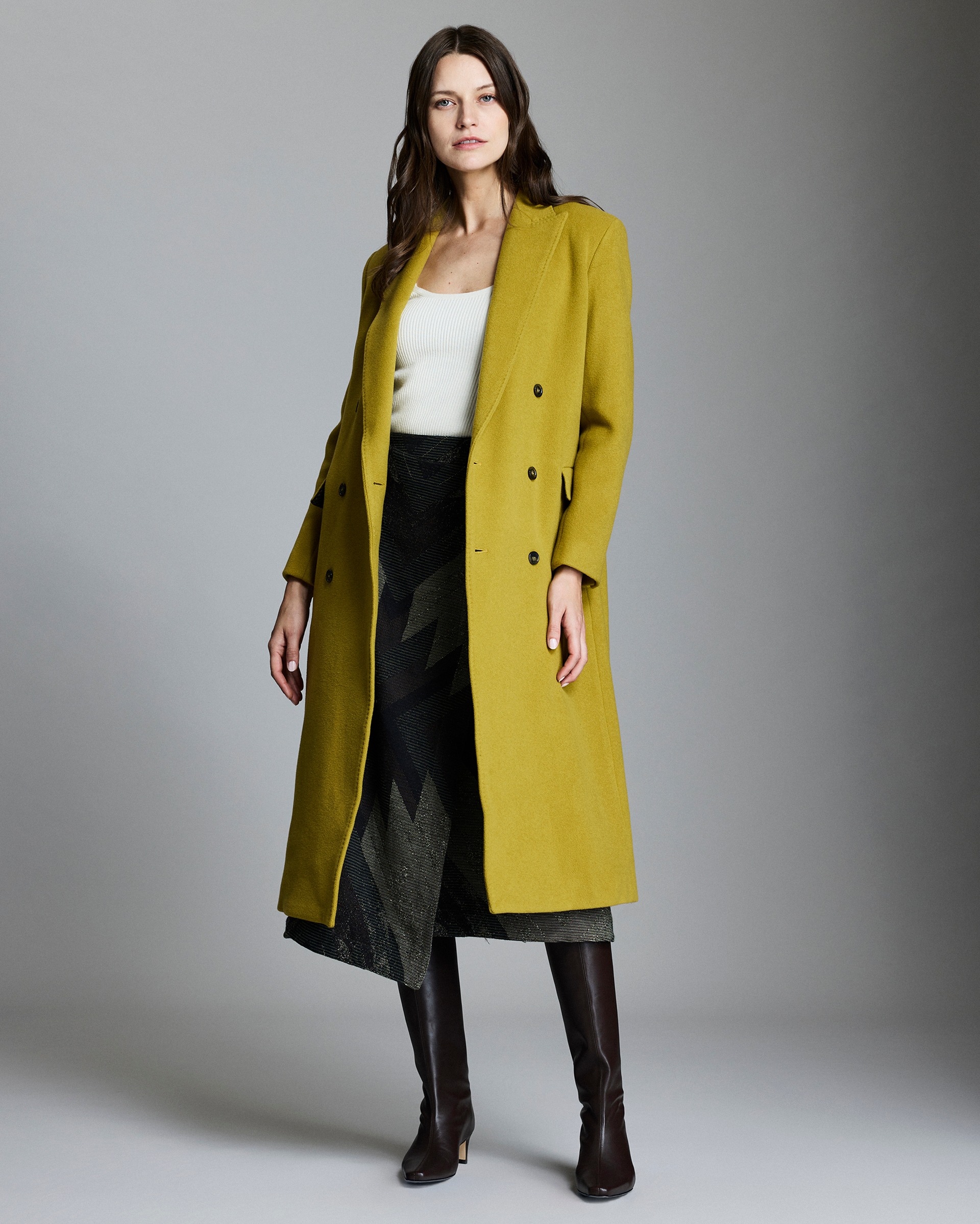 Model shows the fit of the coat.