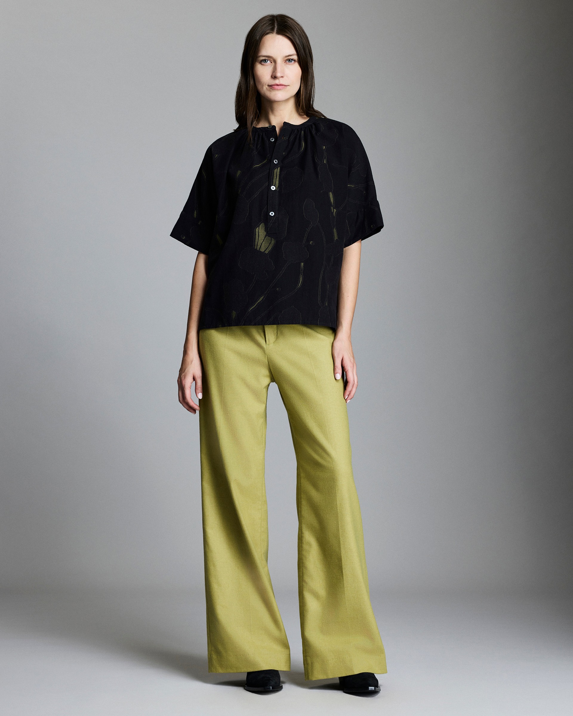 Model shows the fit of the blouse.