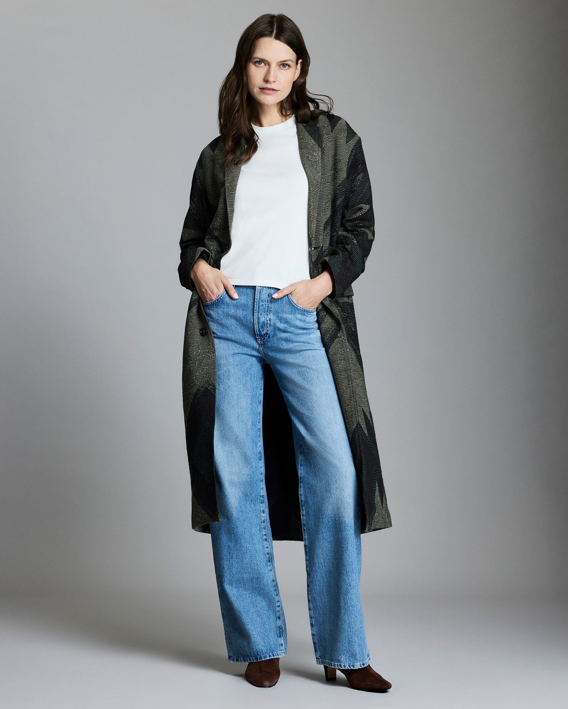 Model shows the fit of the coat.