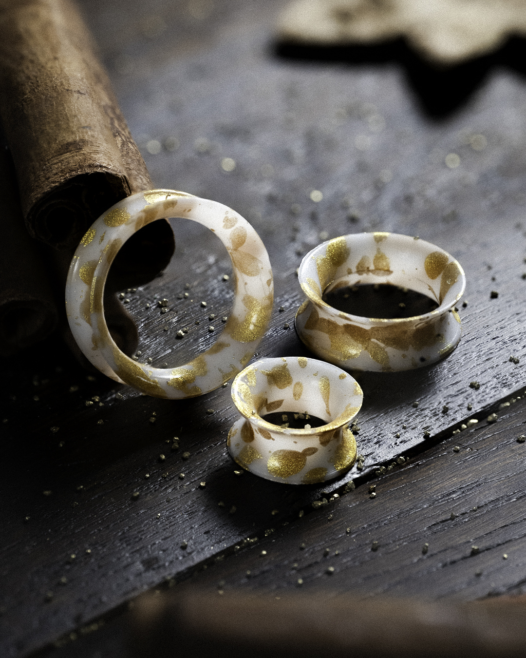 Unique Splatter White & Gold Eyelet Silicone Ear Tunnel