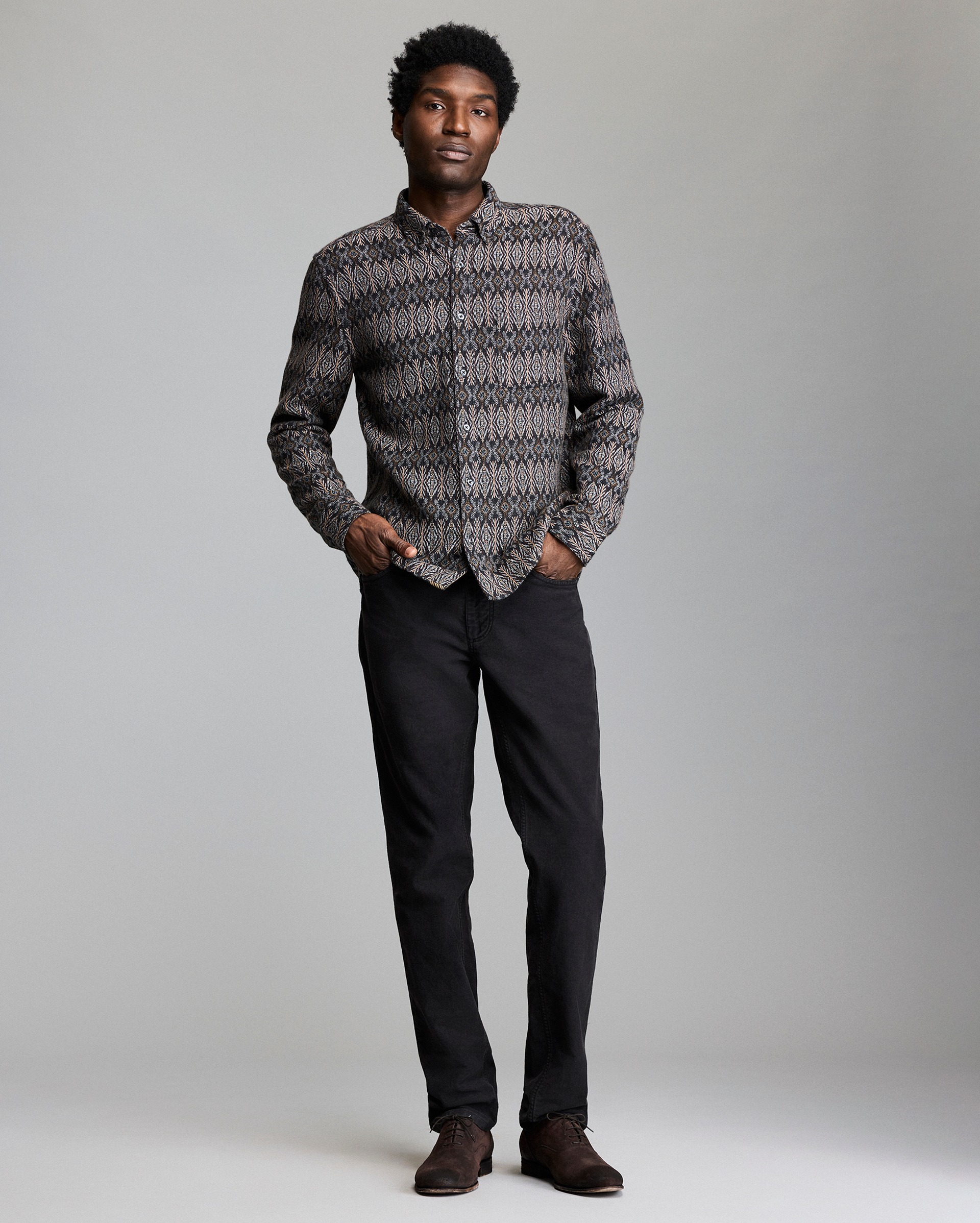 Model shows the fit of the shirt.