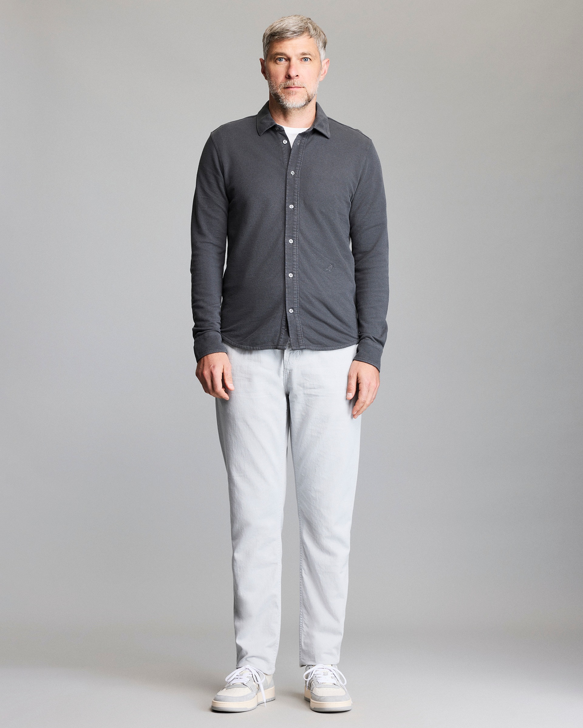 Model shows the fit of the shirt.