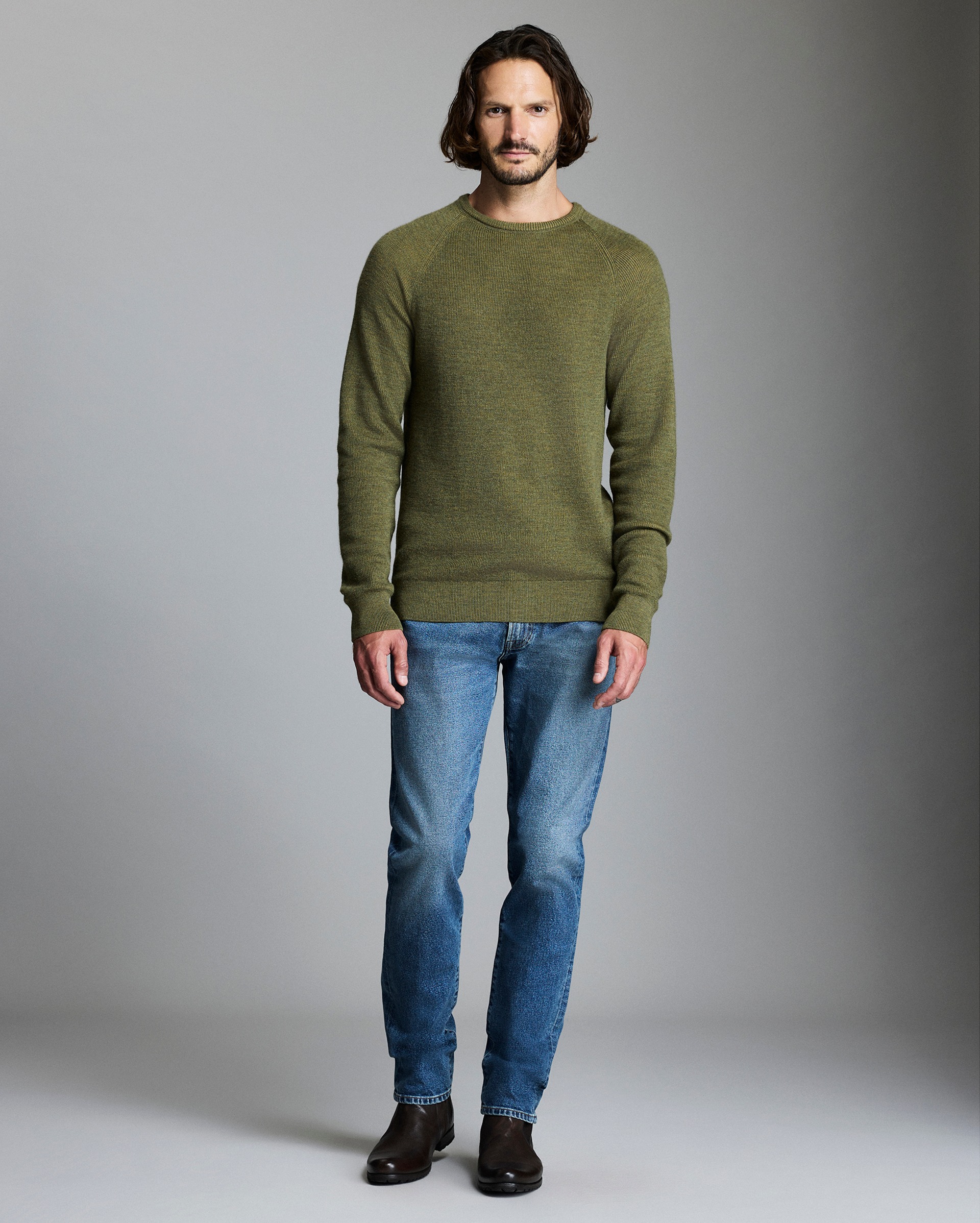 Model shows the fit of the sweater.