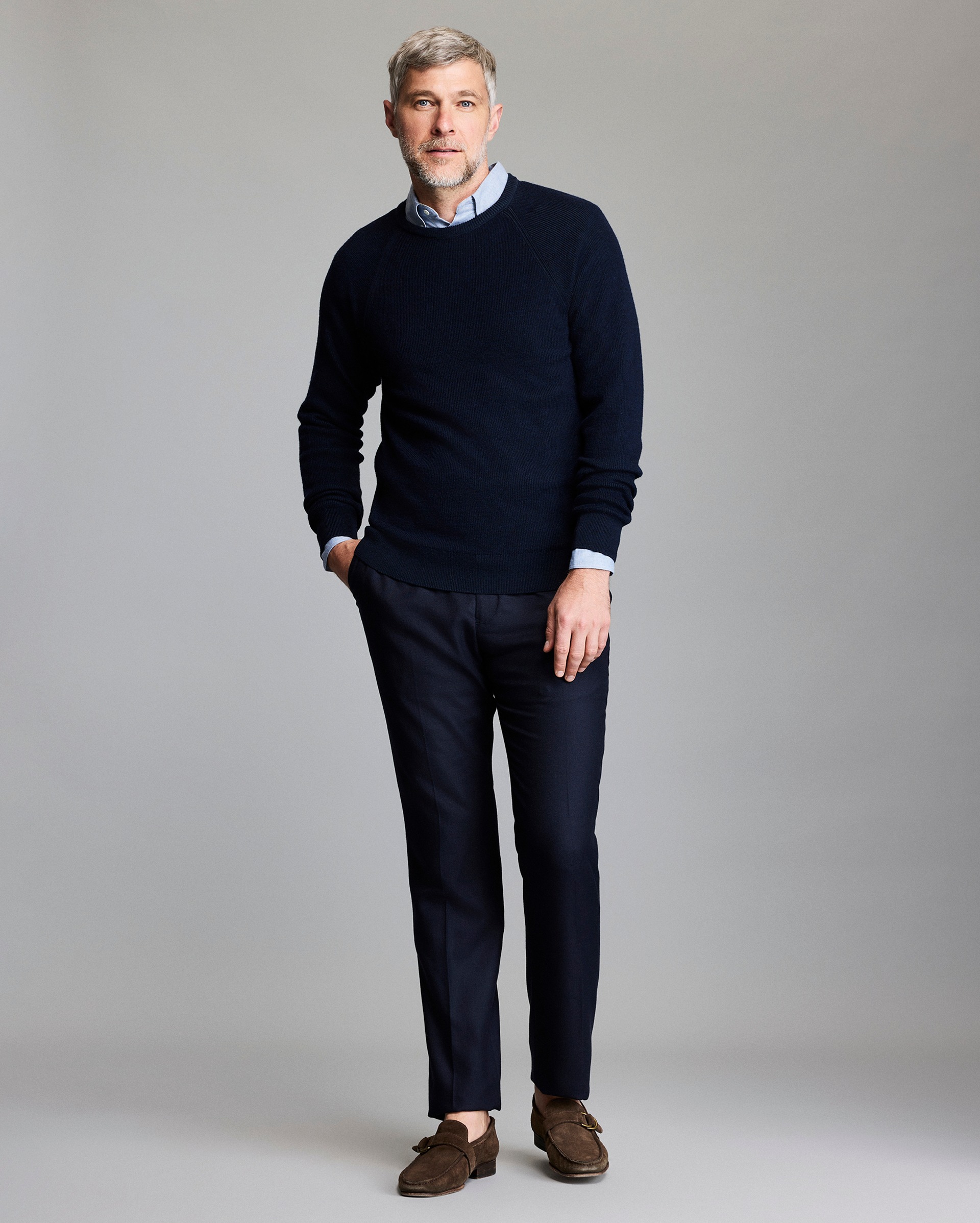 Model shows the fit of the sweater.