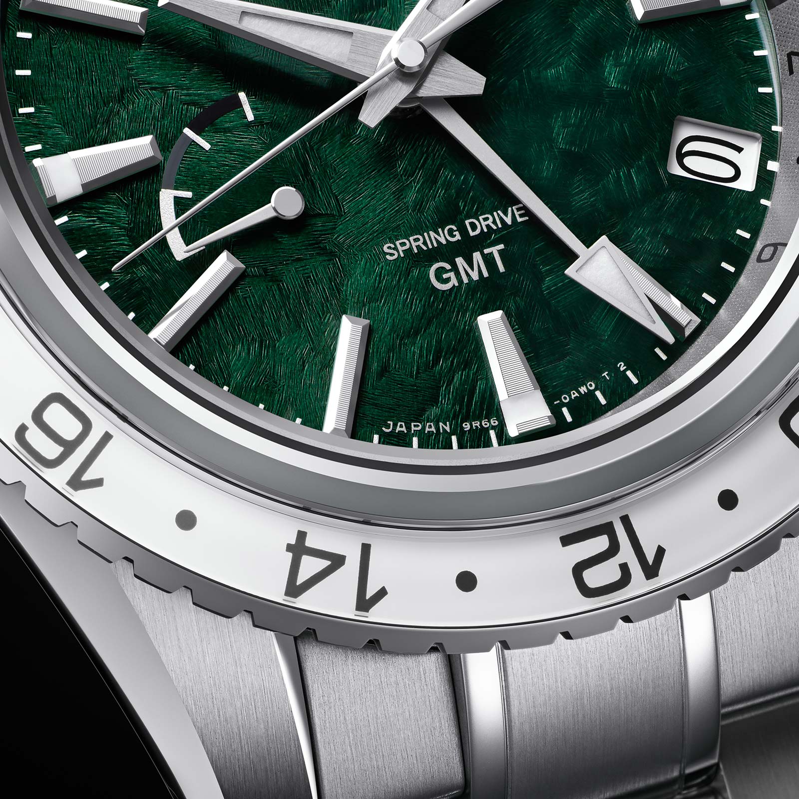 Grand Seiko SBGE295 Spring Drive GMT with green dial. 