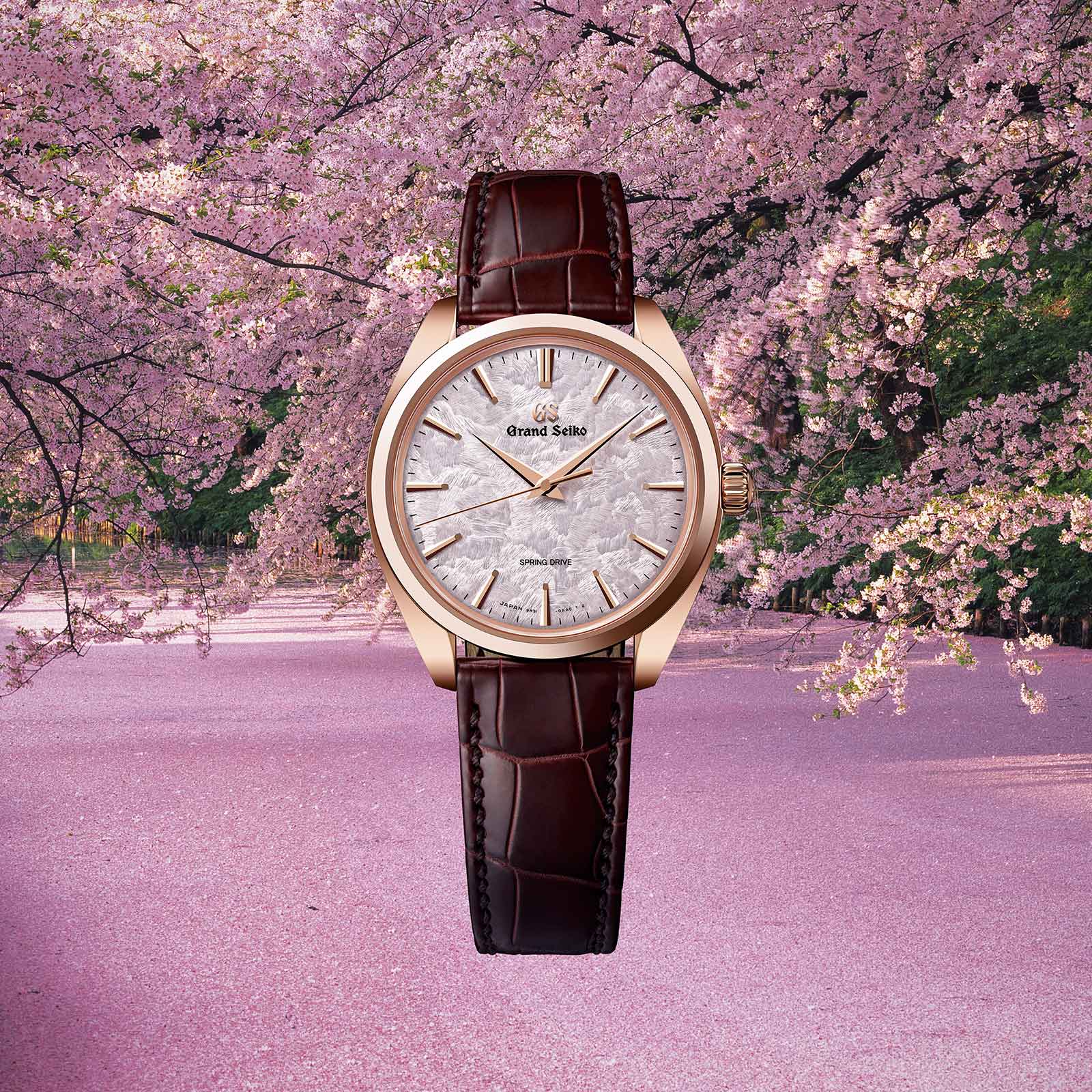 Grand Seiko SBGY026 Spring Drive watch with rose gold case and pink dial.