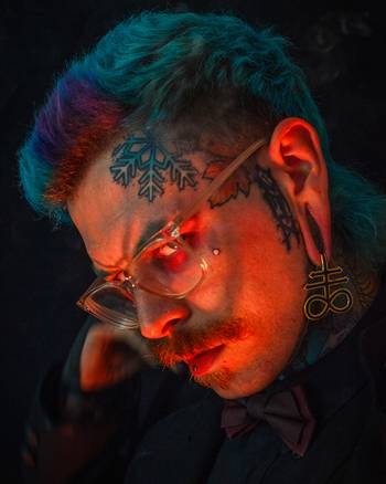 Alternative Tattooed Man wearing Gold Steel Leviathan Cross Ear Weights - Pair
