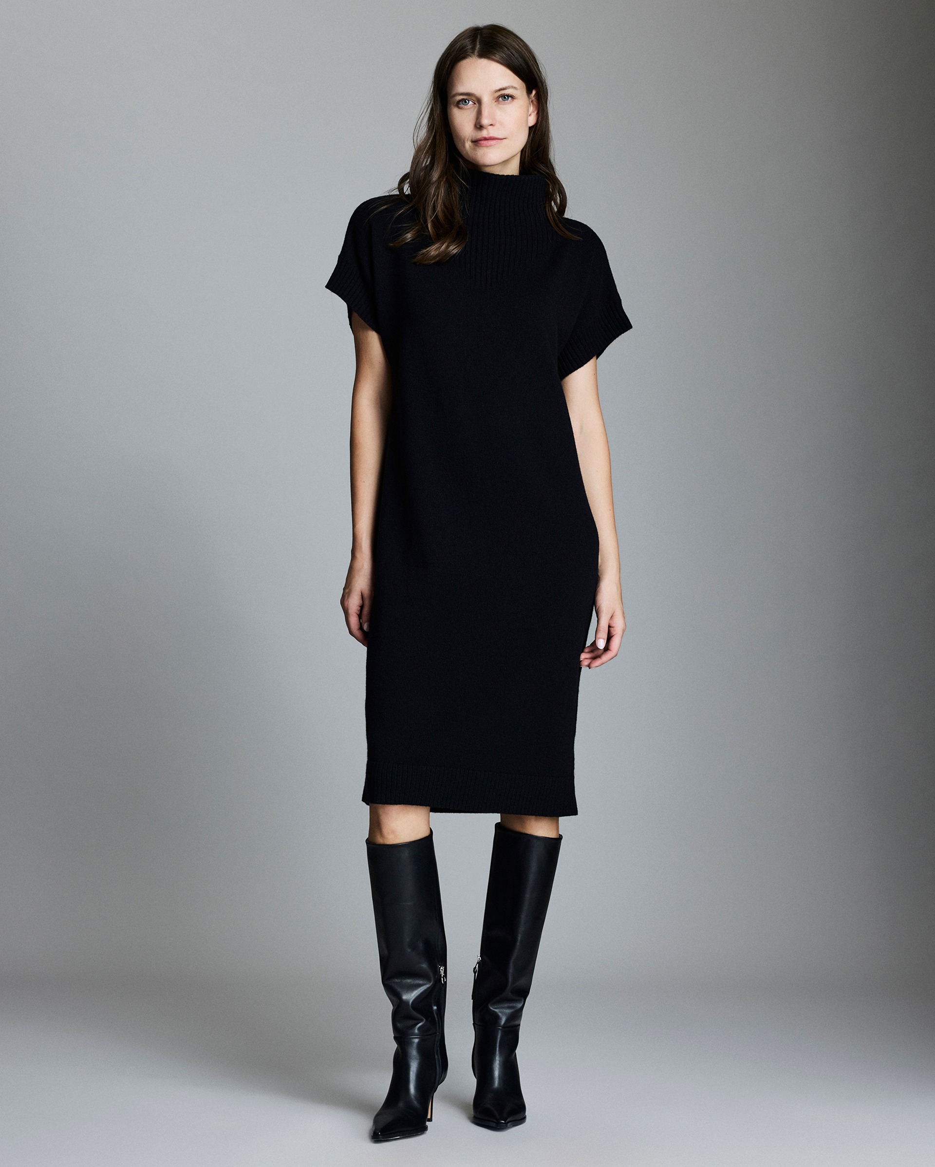 Model shows the fit of the dress.