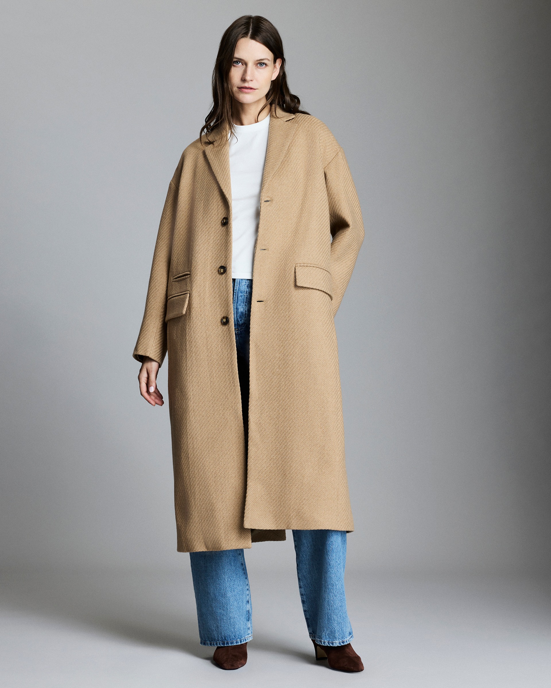 Model shows the fit of the coat.