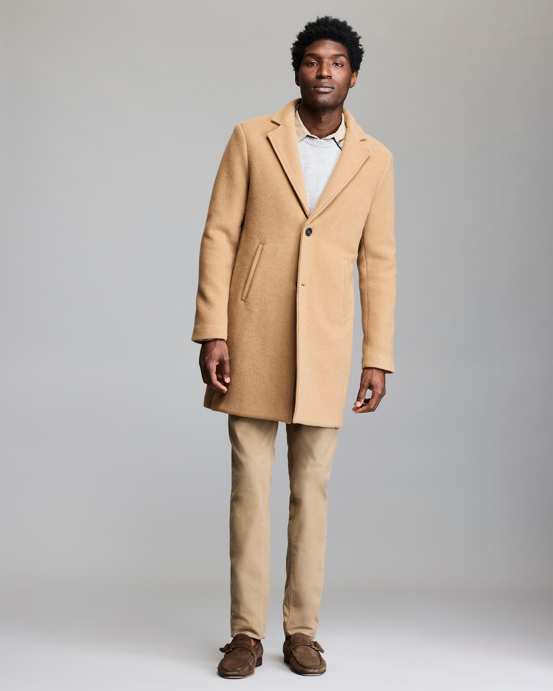 Model shows the fit of the coat.