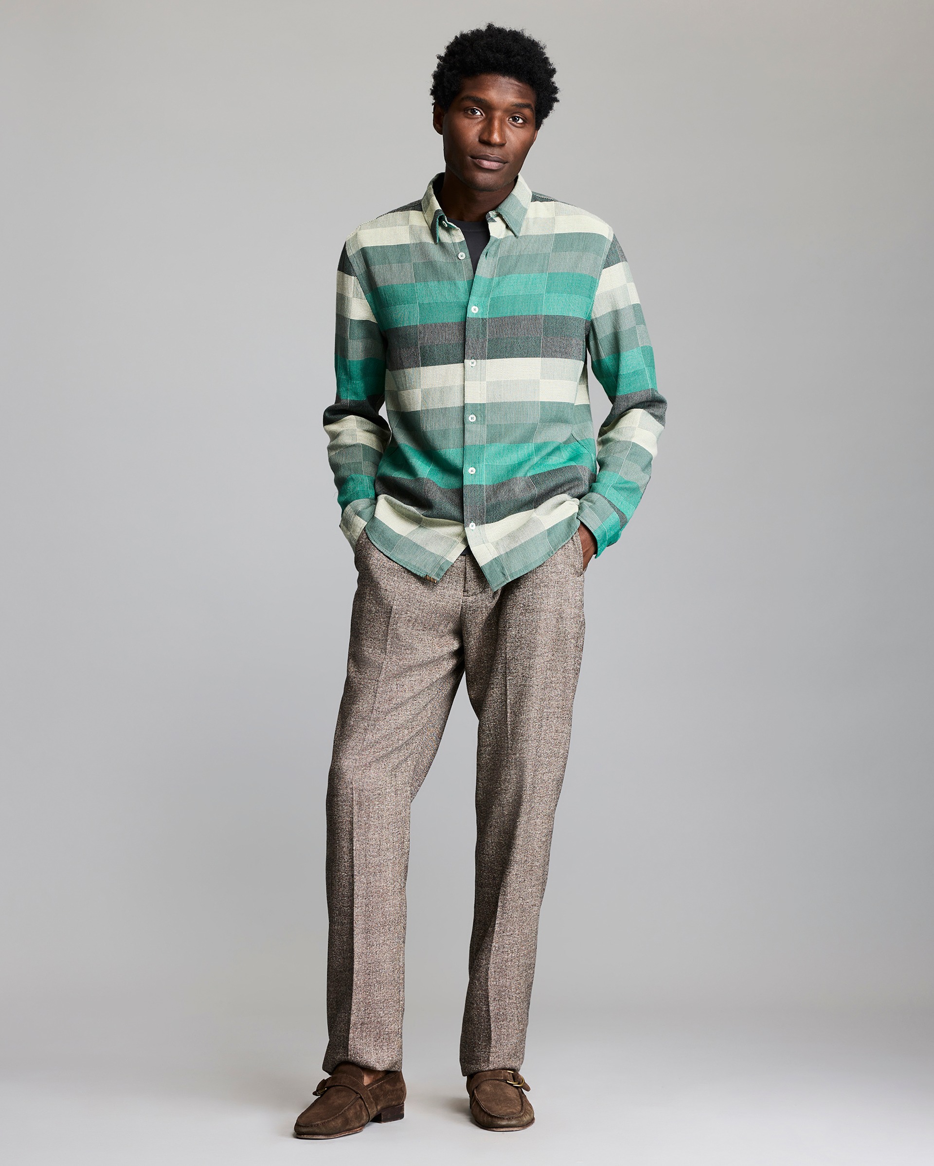 Model shows the fit of the shirt.
