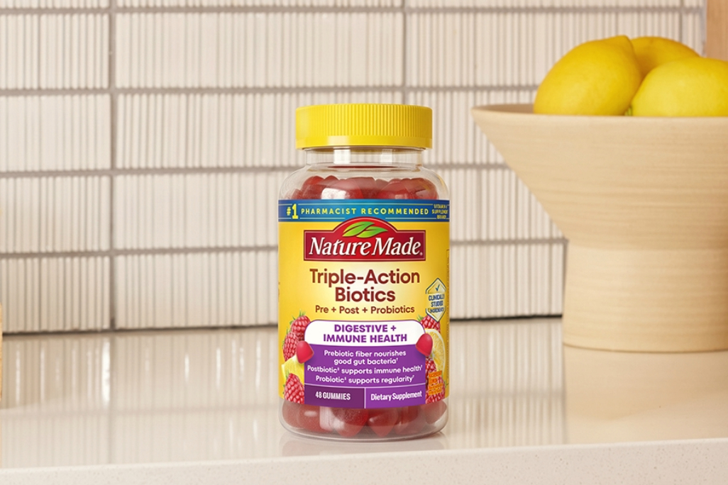 Nature Made Triple-Action Biotic Gummies on a kitchen counter.