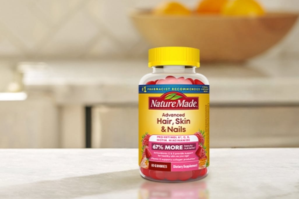 Nature Made Advanced Hair, Skin, Nails Gummies on a counter.