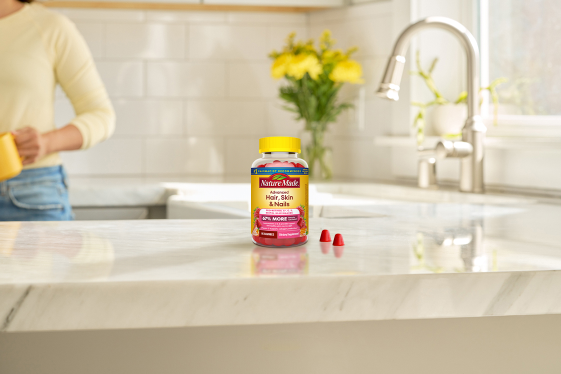 Nature Made Advanced Hair, Skin, Nails Gummies on a kitchen counter