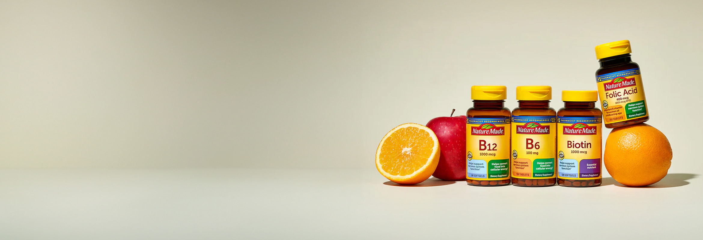 Assortment of Nature Made supplements including B12, Biotin and Folic Acid.