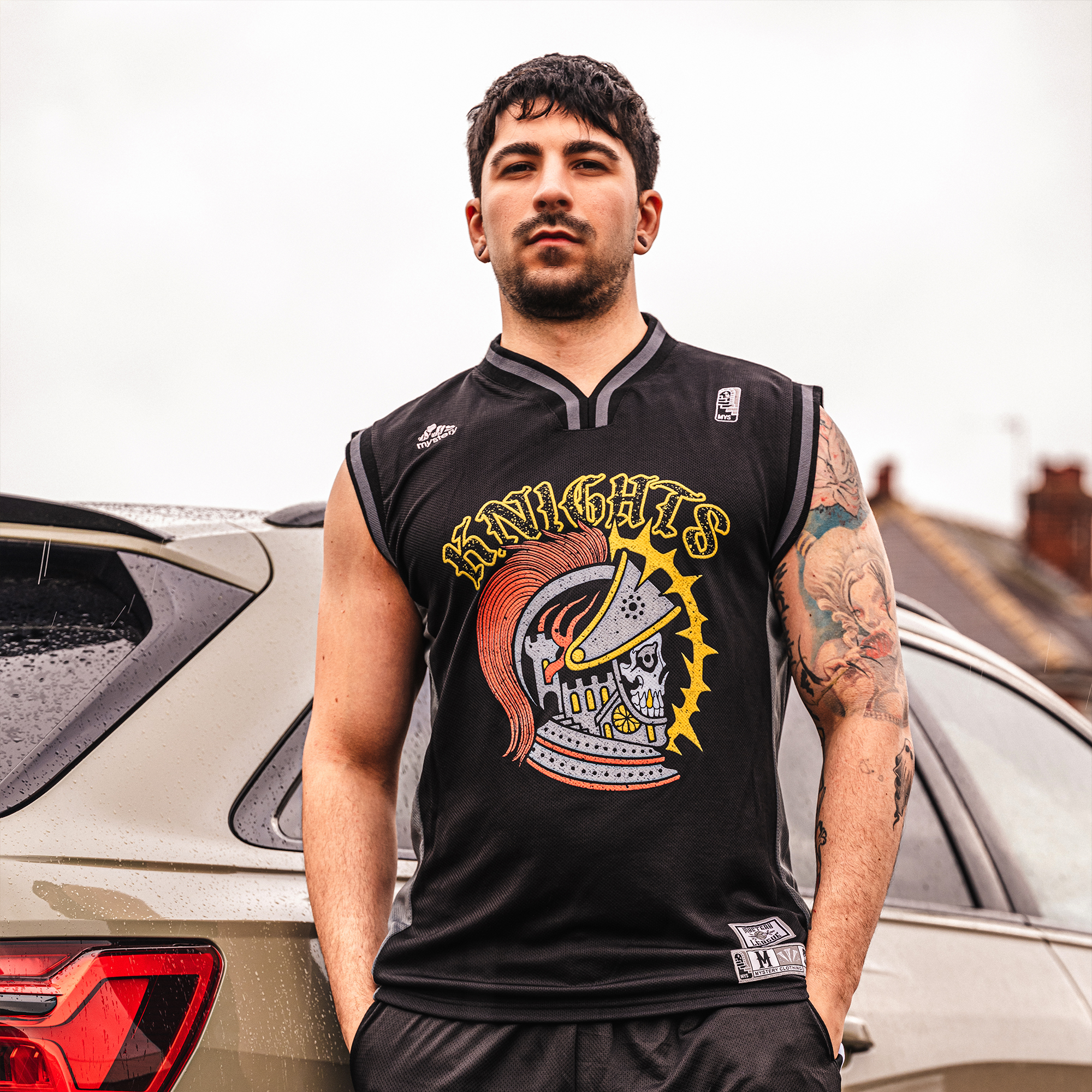 Young Trendy Man Wearing  Cursed Knight Jersey Vest