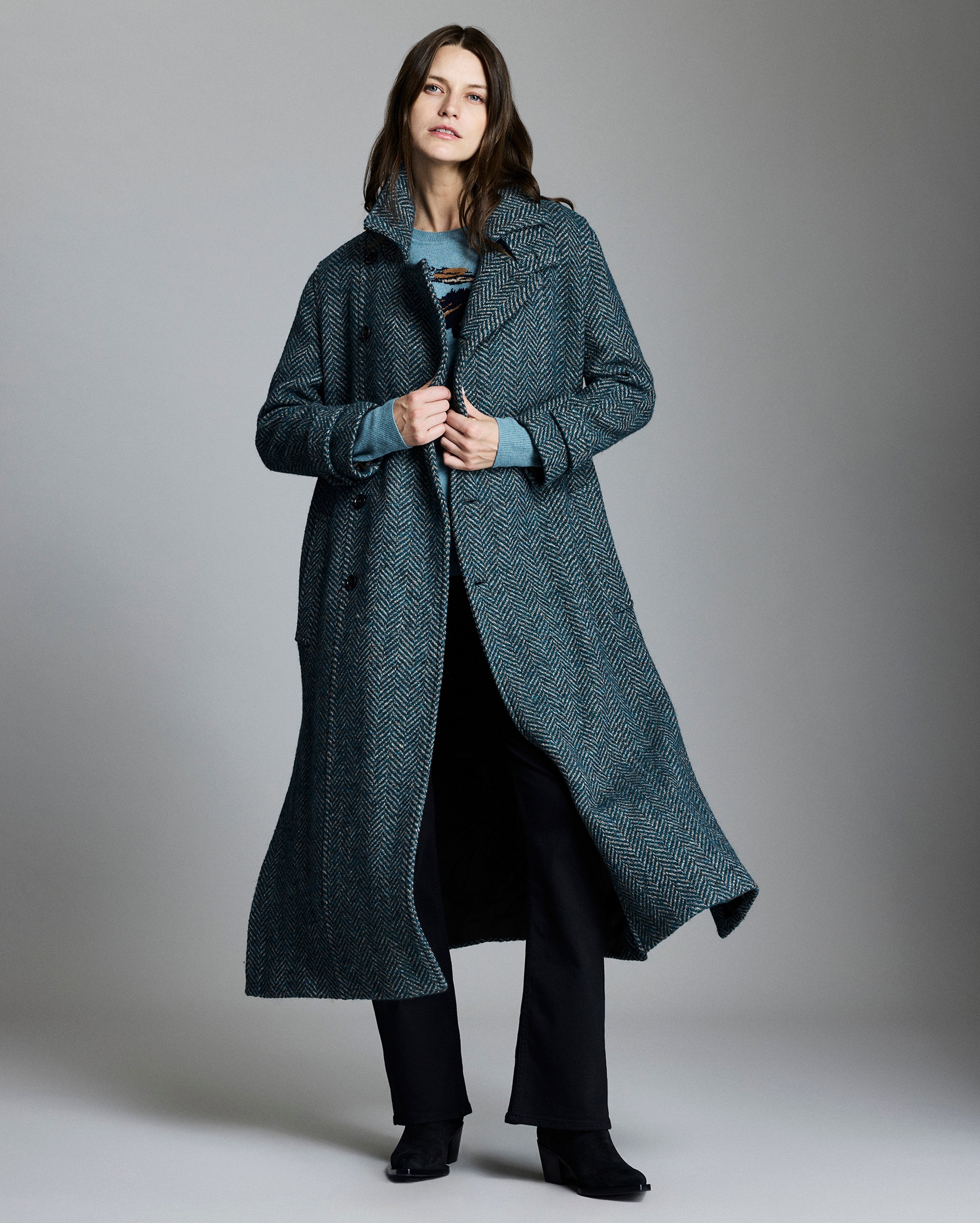 Model shows the fit of the coat.