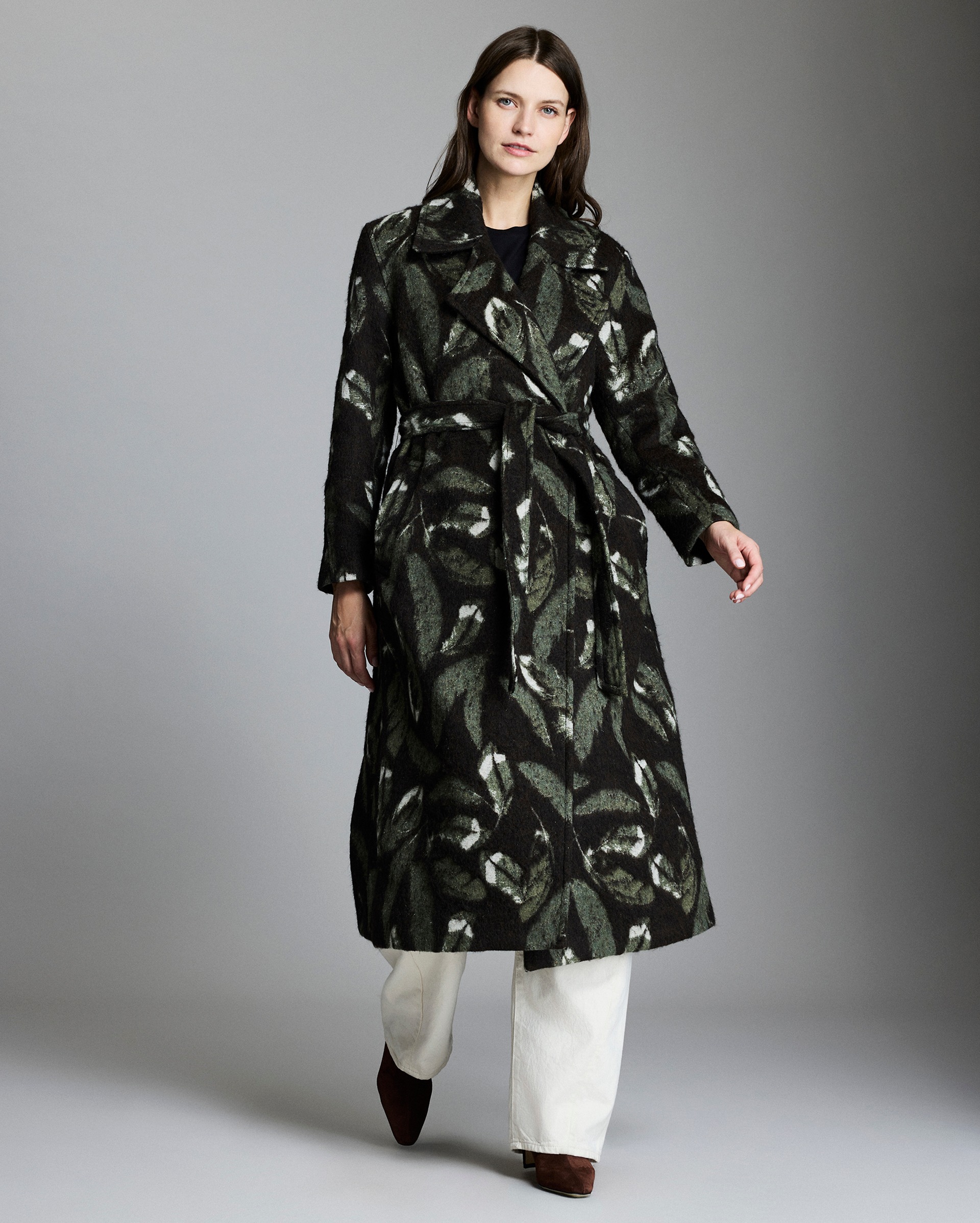 Model shows the fit of the coat.