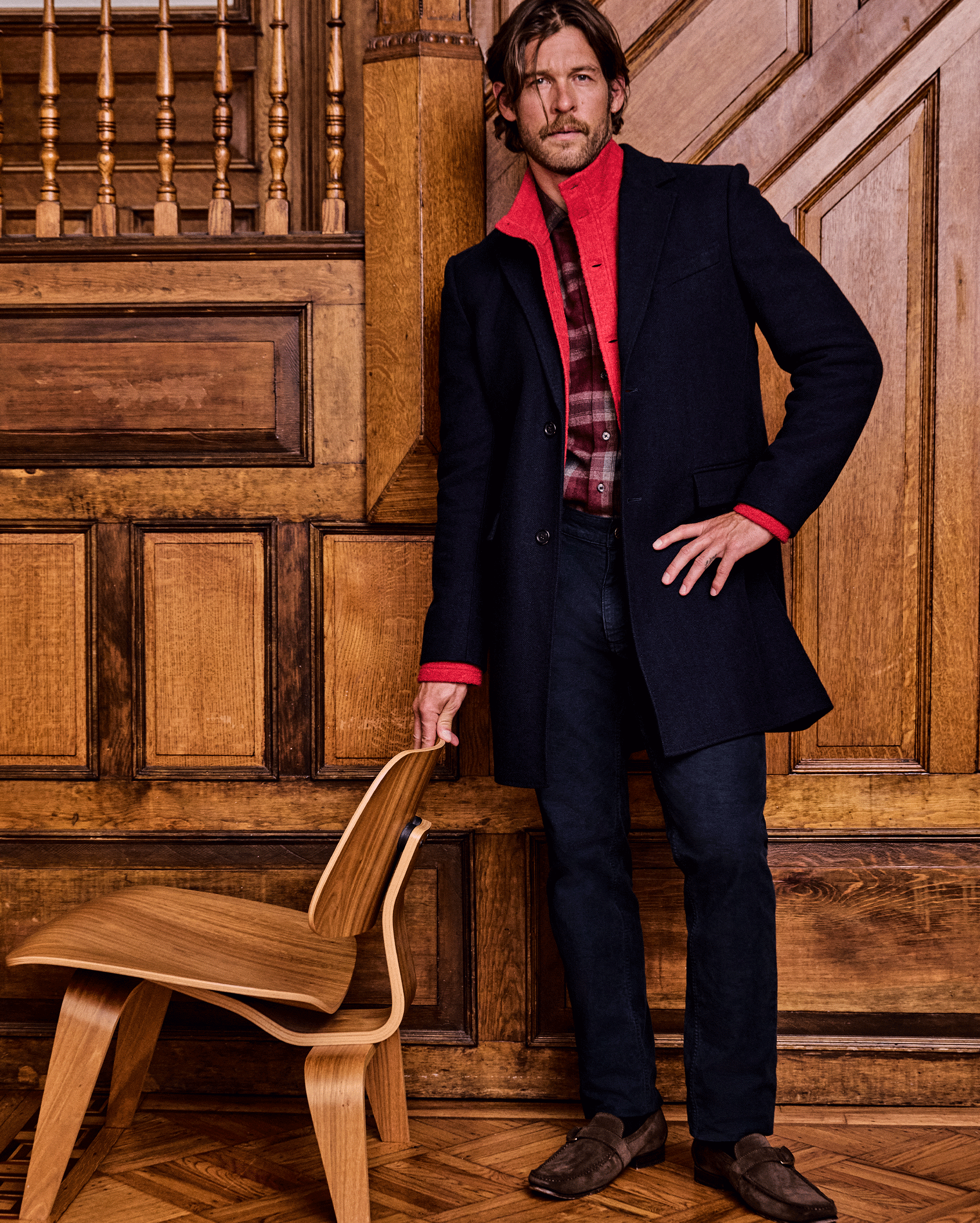 Male model wears various Billy Reid pieces.