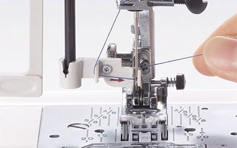 Janome M100QDC Built-In Needle Threader