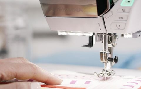 The Bernina 570 QE helps you keep your hands on the fabric
