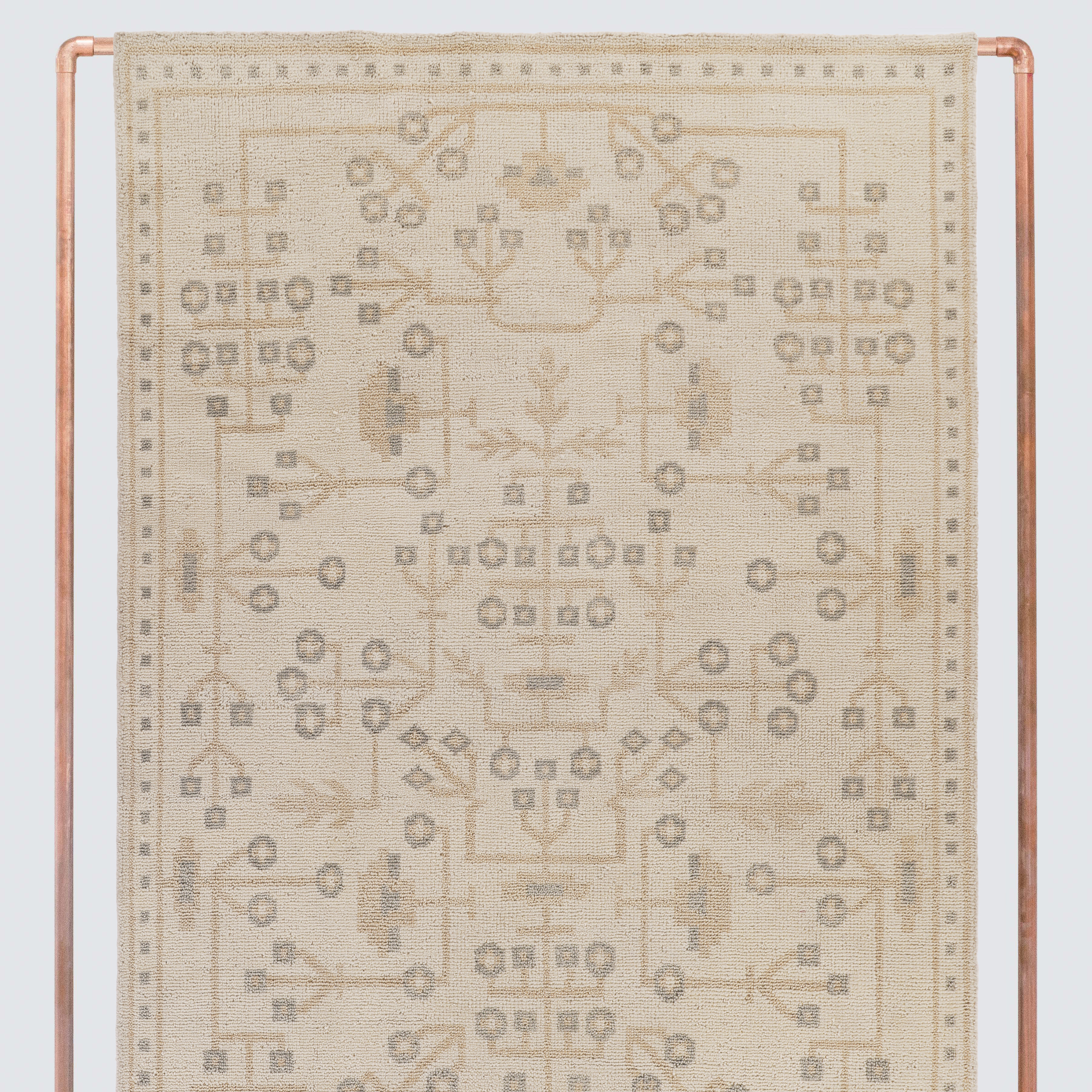 botanical area rug detail, ecru