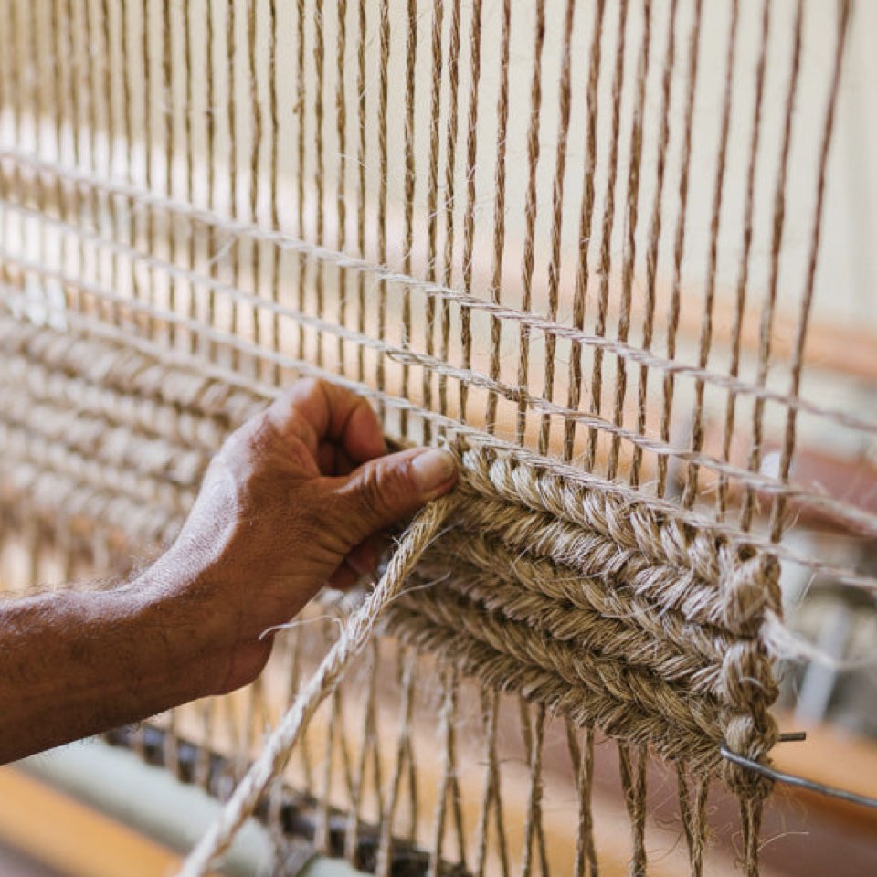 WOVEN BY HAND