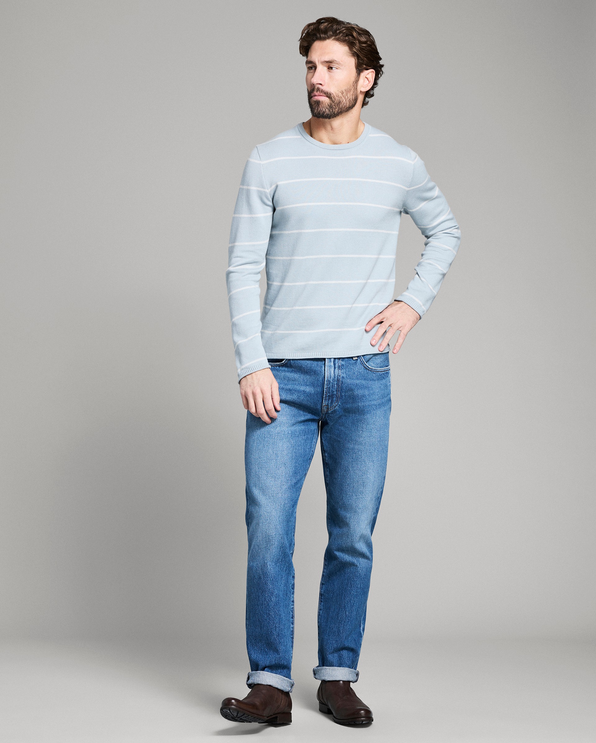 Model shows the fit of the sweater.