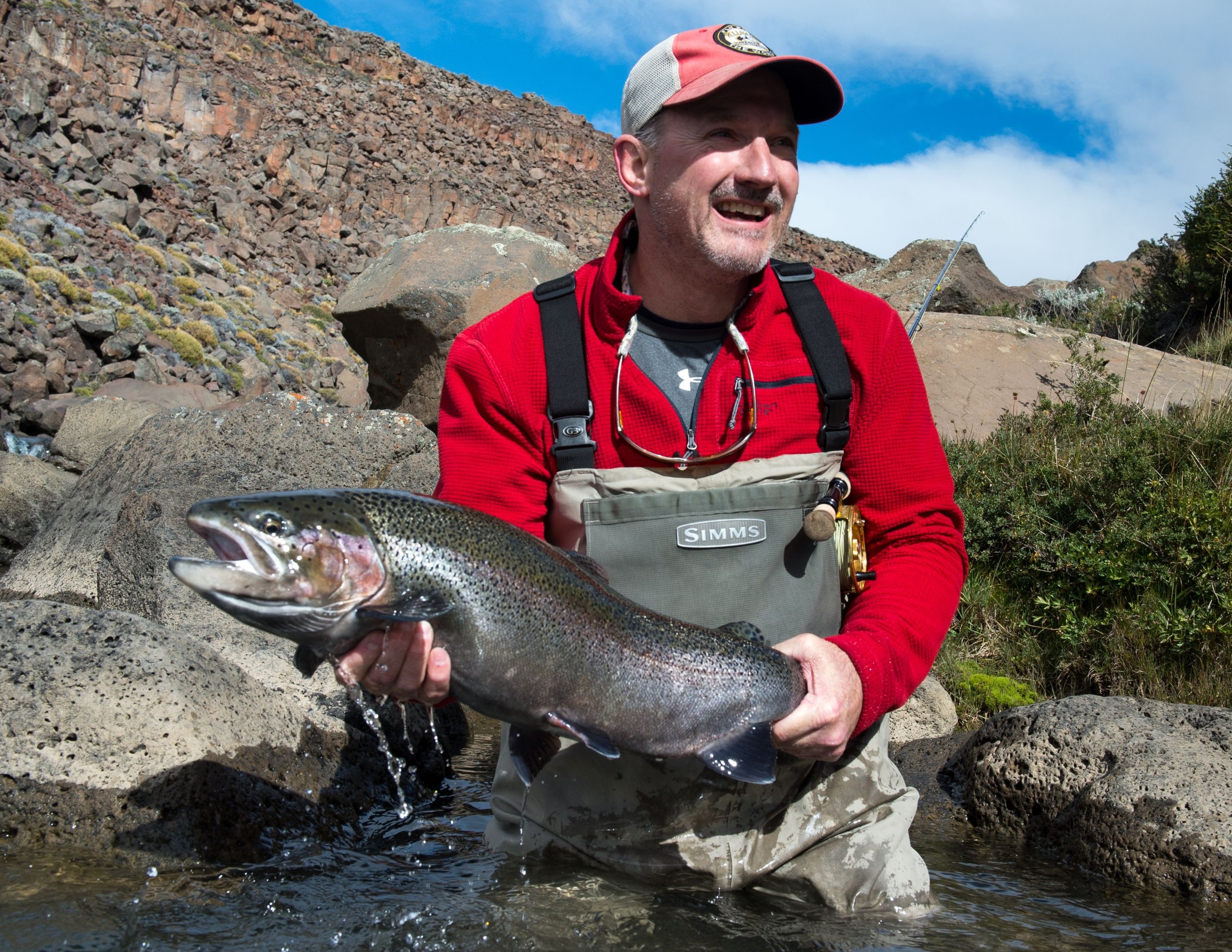 Outdoors International Podcast: Fly Fishing for Giant Rainbow Trout in  Argentina on Stobel Lake