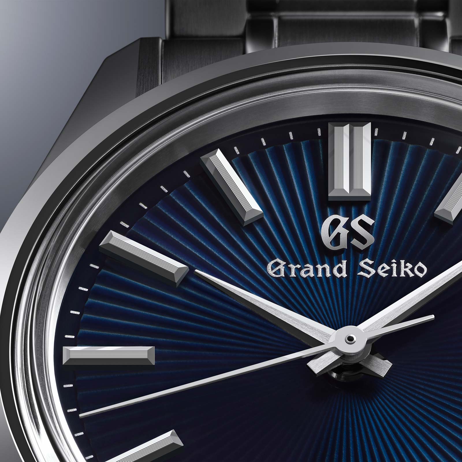 Grand Seiko SBGW299 blue dial sun ray pattern watch. 