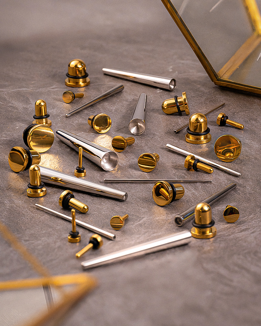 Custom-Plugs---33-piece-Gold-Single-Flare-Steel-Taper-Kit--Plug-Gauge---Lifestyle-3 Beginners Ear Stretching Kit for Ears - 33 Piece Pack - Includes Surgical Steel Tapers & Gold Steel Plug / Gauge