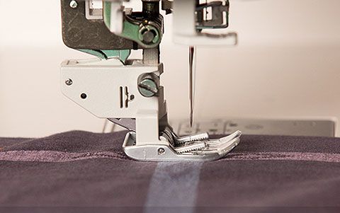 The Janome Atelier 9 has the AcuFeed Flex Feed feature.