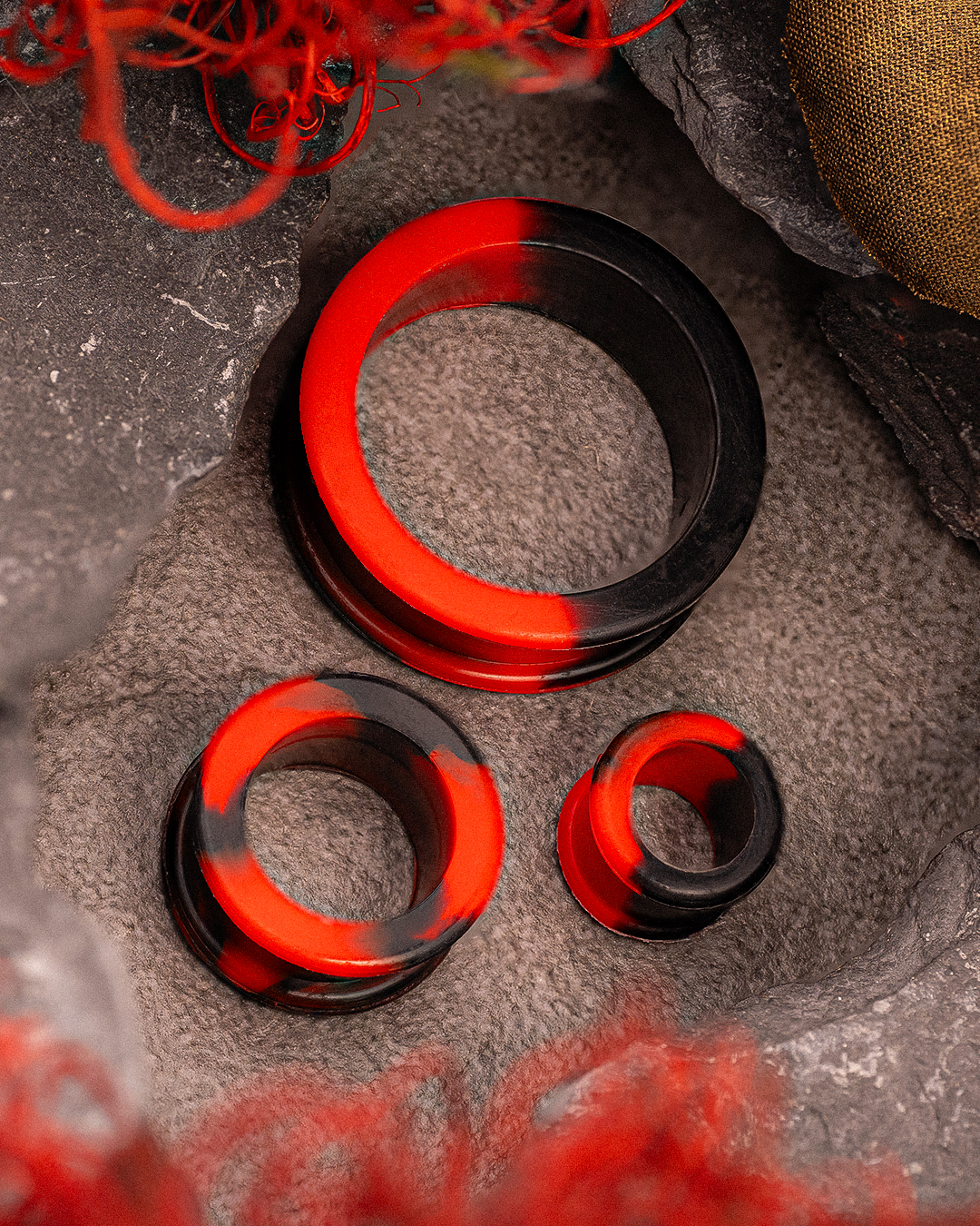 Cool red and black silicone tunnel Marble Red & Black Silicone Ear Tunnel